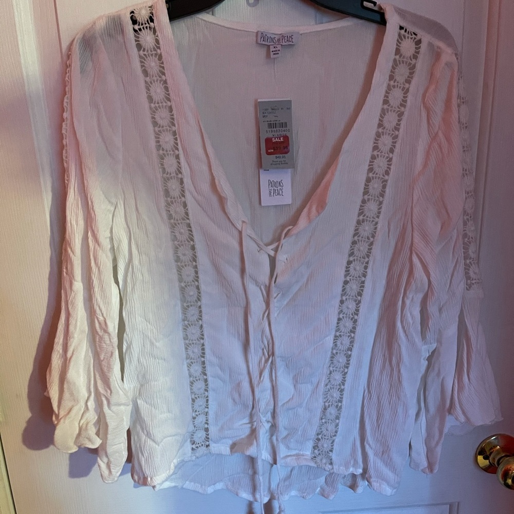 BNWT. White Patrons of Peace blouse.